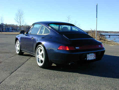 John Geisel & Betsy McNamara
John Geisel and Betsy McNamara's 1995 993 coupe
"We are the second owners, car was born in Germany, and raised in or around Tampa, Fla.
We bought the car in late July 2001, with 23,000 actual miles. The car is a Carrera 2, six speed, 3.6 liter engine, six CD stereo music system. We love the car - it turns a few heads." - John


