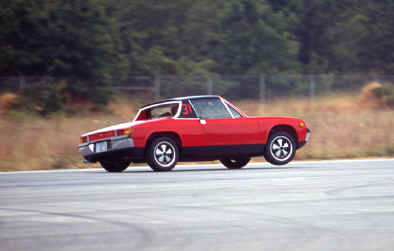 Judy Hendrickson
"1971 914-6 at the Zone AX. I call it the "Ride em Cowboy" shot. Jim Alton took the picture. The "Six" is stock with the exception of the addition of a front roll bar installed to factory specs. Car has over 113K miles. Engine has never been open save for the Carrera tensioner upgrade. My late husband was the original owner of the car. Car finished first in Division at the 1999 Parade Concours, Preservation Class and was a close second for the Overall Preservation trophy. Car was 90-95% repainted in 1977. Engine panel is still original paint. Everything else about the car - interior, carpets, etc is original save for normal maintenance parts. All maintenance replacements are OEM parts. Car color is Bahia Red. Car is #385 out of the 435 made in 1971, manufactured in May 1971." - Judy Hendrickson

Check out Judy's [url=http://www.ncr-pca.org/members/june_2005.htm/]June 2005 Porsche of the Month[/url] too.
